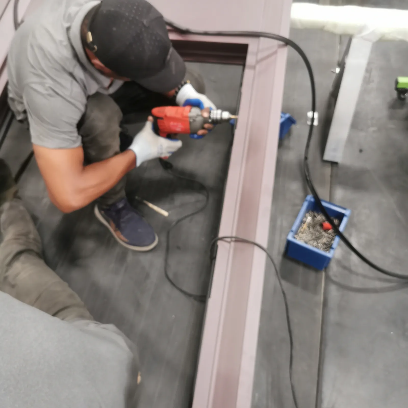 Technician assembling a door frame